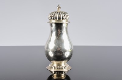 Lot 273 - A George V silver sugar sifter by RB and retailed through Harrods