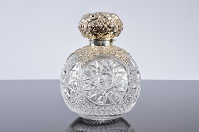 Lot 283 - A large Edwardian cut glass and silver mounted scent bottle by William Hutton & Son