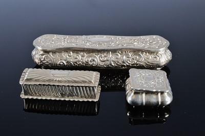 Lot 284 - Three late Victorian and Edwardian silver dressing table boxes