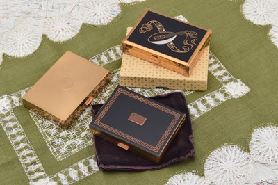 Lot 337 - Three Agme gilt metal rectangular musical compacts