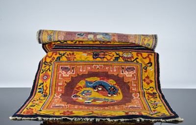 Lot 526 - An early 20th century Chinese temple carpet