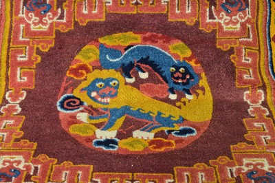 Lot 526 - An early 20th century Chinese temple carpet