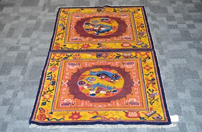 Lot 526 - An early 20th century Chinese temple carpet