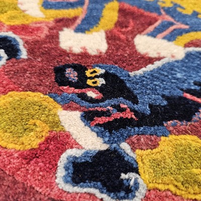 Lot 526 - An early 20th century Chinese temple carpet