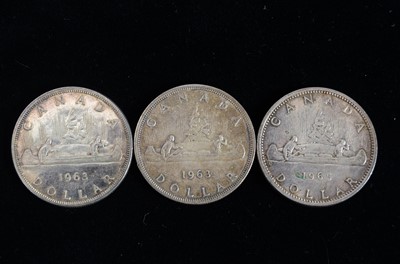 Lot 77 - Three 1960s Canadian silver dollars