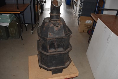 Lot 3 - A vintage Three Tier Iron Stove by Smith & Wellstood