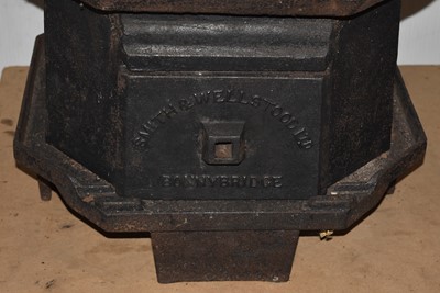 Lot 3 - A vintage Three Tier Iron Stove by Smith & Wellstood