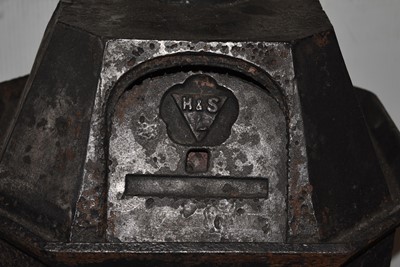Lot 3 - A vintage Three Tier Iron Stove by Smith & Wellstood