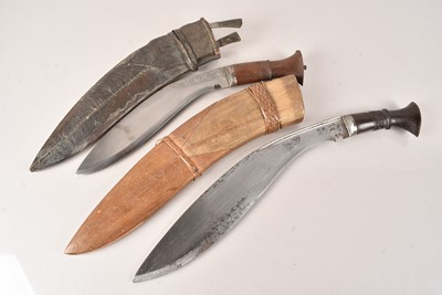 Lot 305 - Two Middle Eastern Kukri Knives