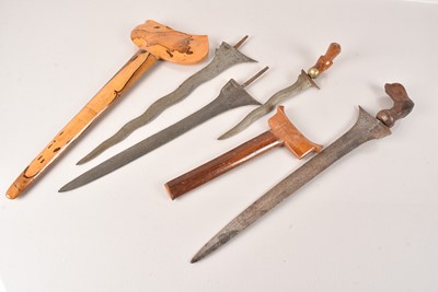 Lot 307 - A group of four Kris knives