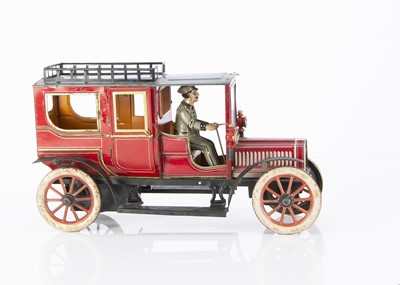 Lot 314 - A George Carette clockwork lithographed tinplate Landaulette toy automobile circa 1910