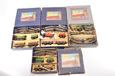 Lot 478 - Four Hornby 0 Gauge early post-war MO and M1 Clockwork Train Sets (4)
