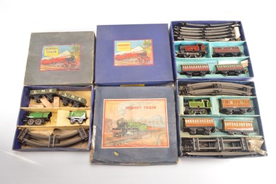 Lot 485 - Three Hornby 0 Gauge early post-war 101 and M1 clockwork Train Sets