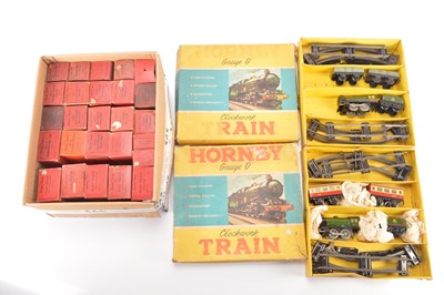Lot 555 - Hornby 0 Gauge pre and postwar Goods wagons and late issue sets (28)
