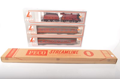 Lot 675 - Lima O gauge Locomotive and coaches with Peco track all in original boxes (4)