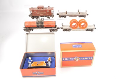 Lot 707 - Lionel 0 Gauge clockwork Hand Cart and four Goods Wagons (5)