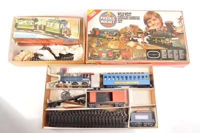 Lot 709 - Timpo 0 Gauge Wild West Cavalry Ambush Set and pair of 0 Gauge Trambino clockwork Tram sets on S Gauge Track (3 set + extra track)