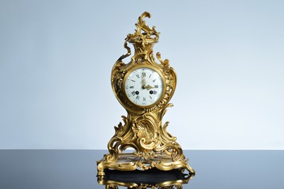 Lot 19 - A late 19th or early 20th century brass Louis XVI style mantle clock