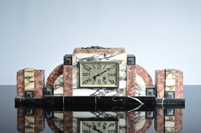 Lot 27 - An Art Deco period marble and hardstone clock and garniture