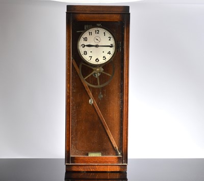 Lot 29 - A large c1930s oak cased electric wall clock