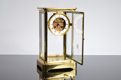 Lot 43 - A modern brass and glazed mantle clock