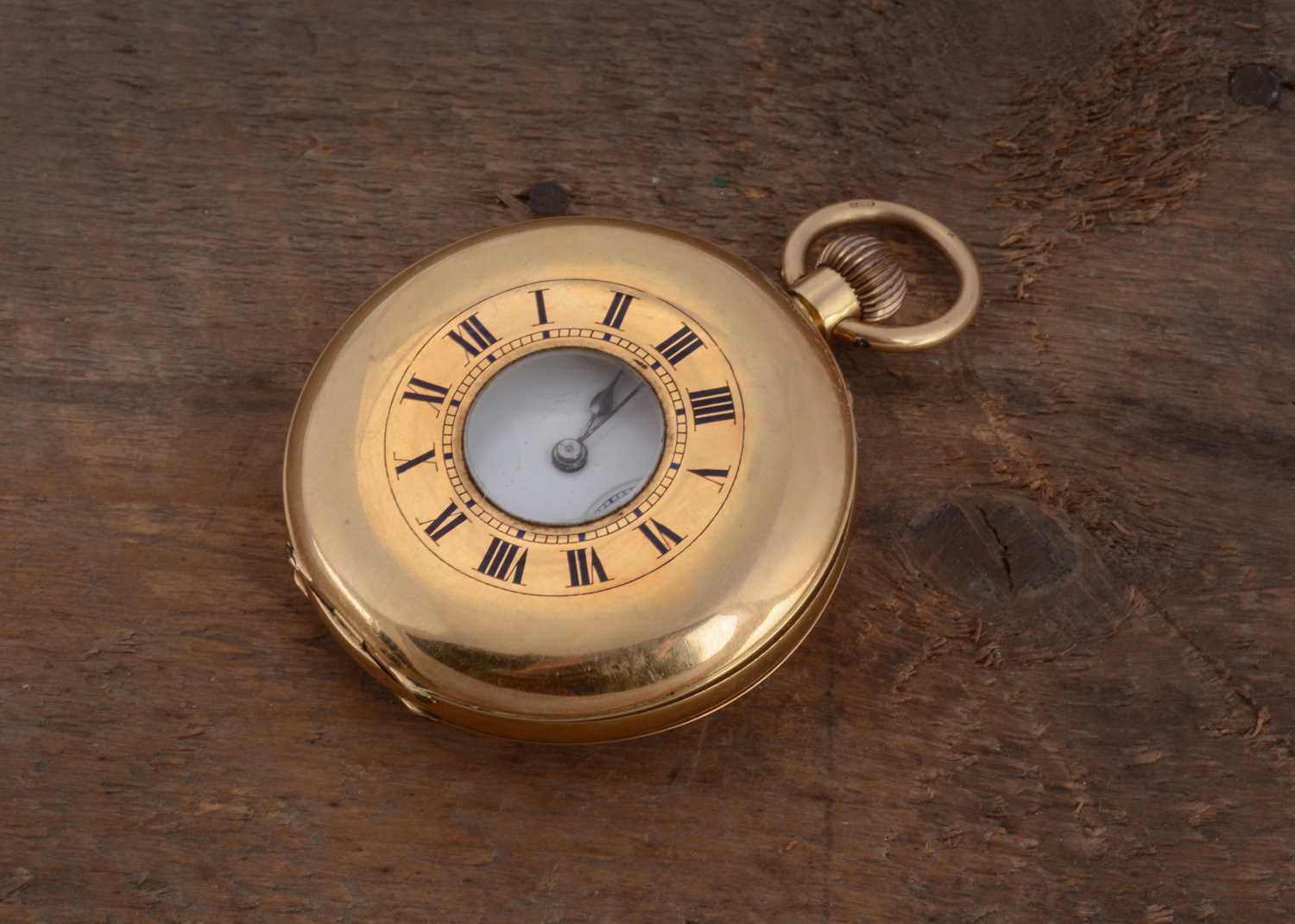 Lot 87 - A circa 1930s 18ct gold half hunter pocket watch