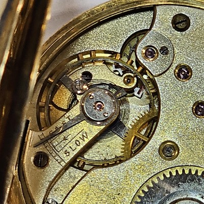 Lot 87 - A circa 1930s 18ct gold half hunter pocket watch