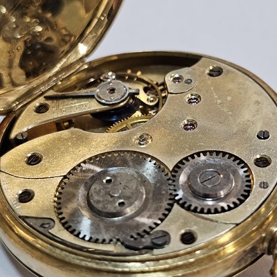 Lot 87 - A circa 1930s 18ct gold half hunter pocket watch