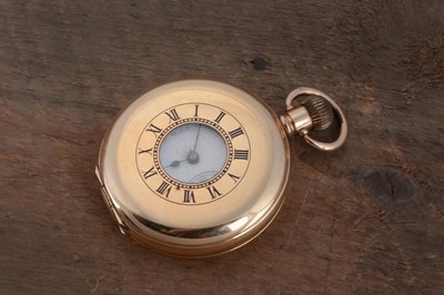 Lot 92 - An early 20th century Waltham gold platd half hunter pocket watch