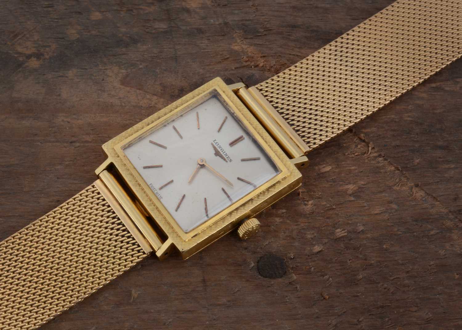 Lot 141 - A 1960s Longines manual wind 18ct gold dress wrist watch