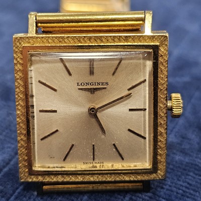 Lot 141 - A 1960s Longines manual wind 18ct gold dress wrist watch