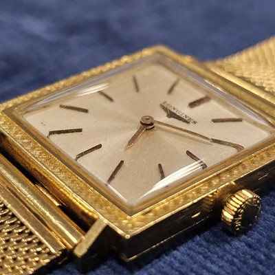 Lot 141 - A 1960s Longines manual wind 18ct gold dress wrist watch