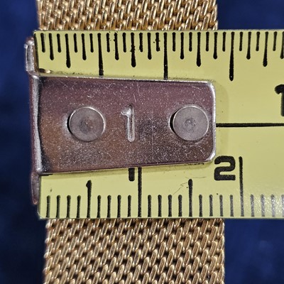 Lot 141 - A 1960s Longines manual wind 18ct gold dress wrist watch