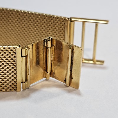 Lot 141 - A 1960s Longines manual wind 18ct gold dress wrist watch