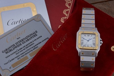 Lot 153 - A 1990s Cartier Santos quartz stainless steel and gold wrist watch