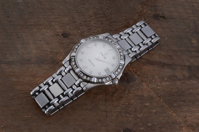 Lot 158 - A circa 1990s Concord quartz stainless steel and diamond set wrist watch