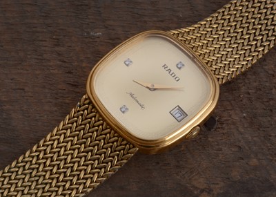 Lot 160 - A circa 1980s Rado automatic gold plated wrist watch