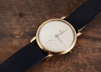 Lot 215 - a 1950s Omega manual wind 9ct gold presentation wraist watch