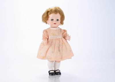Lot 114 - A 1950s Pedigree hard plastic walking doll