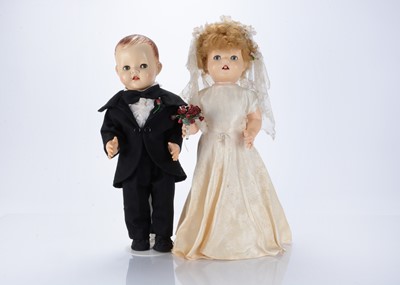 Lot 170 - Two hard plastic dolls dressed as Bride and Groom