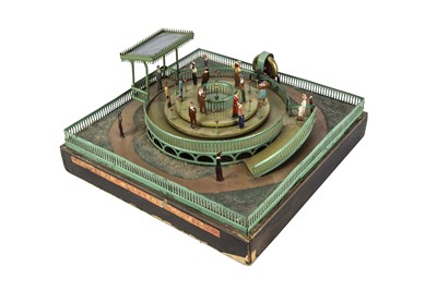 Lot 421 - A rare French tinplate flywheel driven toy Moving Pavement or Trottoir Roulant Paris 1900
