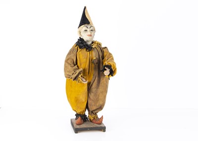 Lot 422 - A German clockwork shop window nodding clown circa 1900