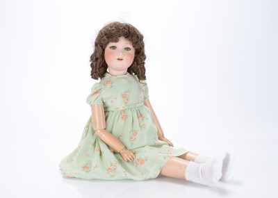 Lot 458 - A 1920s "Nunsuch" Nunn & Smeed Bisque British Doll