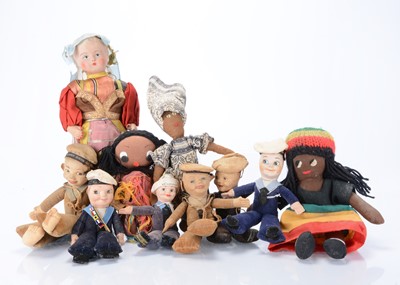 Lot 497 - Nine cloth dolls
