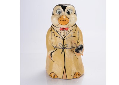 Lot 515 - A papier-mâché penguin smoking