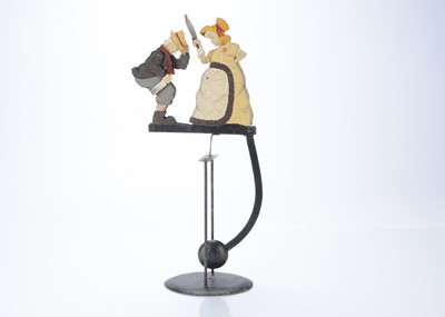 Lot 546 - A recent painted steel balance toy
