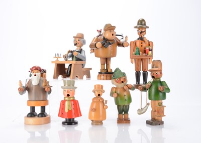 Lot 554 - Eight recent German turned wooden Smokers