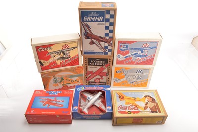 Lot 464 - ERTL and Similar Diecast Aircraft Coin Banks All Food and Drink Branded (9)
