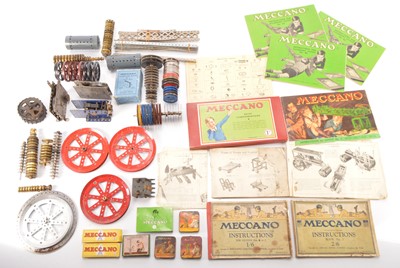 Lot 568 - Large collection of Meccano Gears wheels bevel Gears Helical Gears Contrate wheels, Pulleys Motors and other items and instructions books from 1920's-1950's (qty)