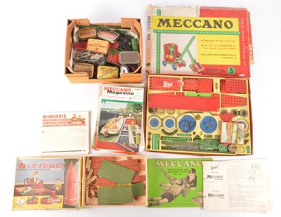 Lot 573 - Meccano Set No 5 various loose parts and collection of 1970's Meccano Magazines and Minibrix Set No 1 (qty)